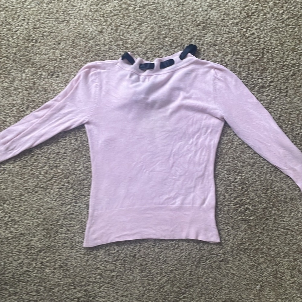 Pink sweater with black tie along neckline - Picture 10 of 11